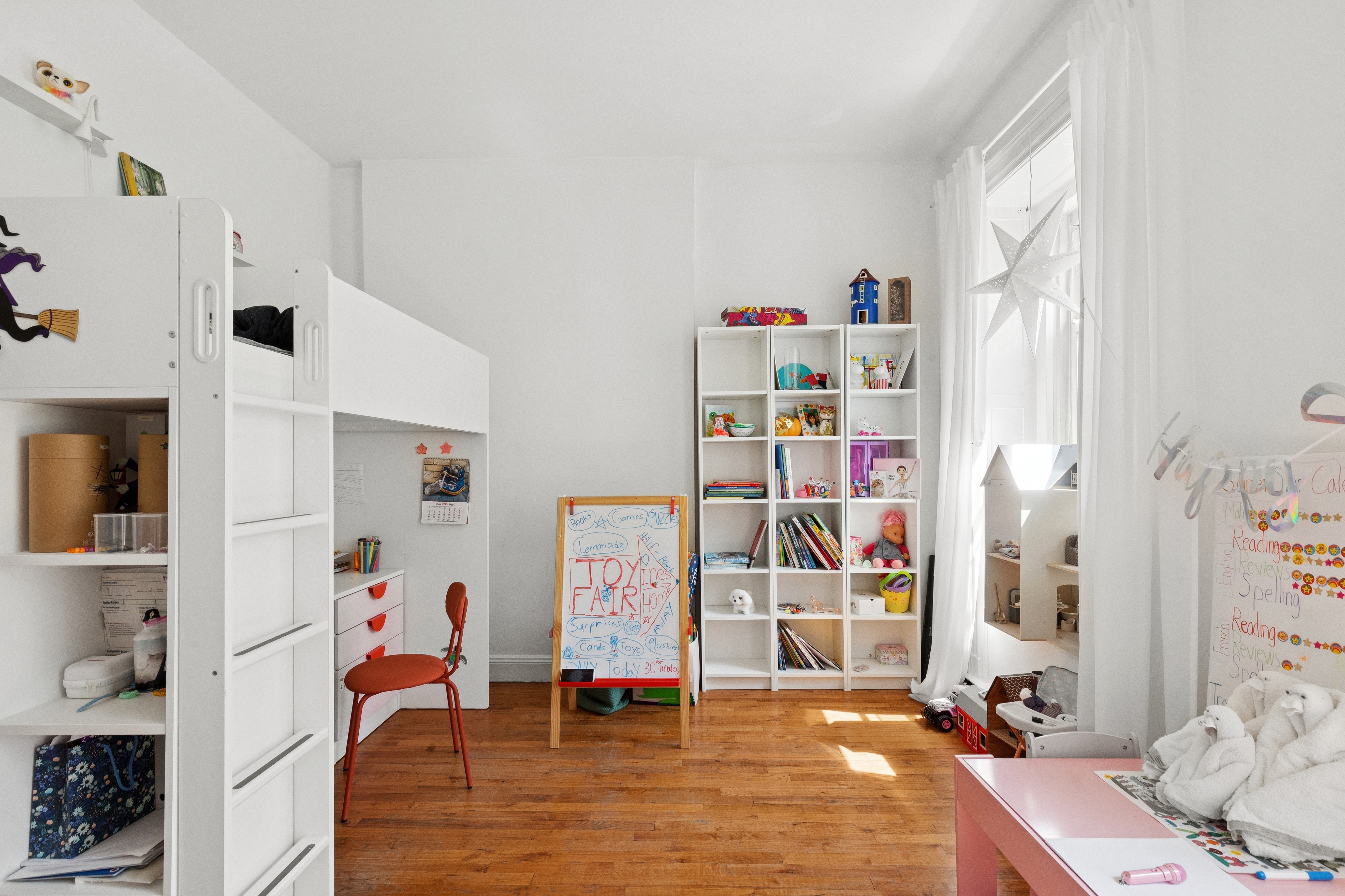 53 West 82nd Street, Unit 2 Manhattan, NY 10024 - Photo 6 of 10 a view of walk in closet with clothes and shoes