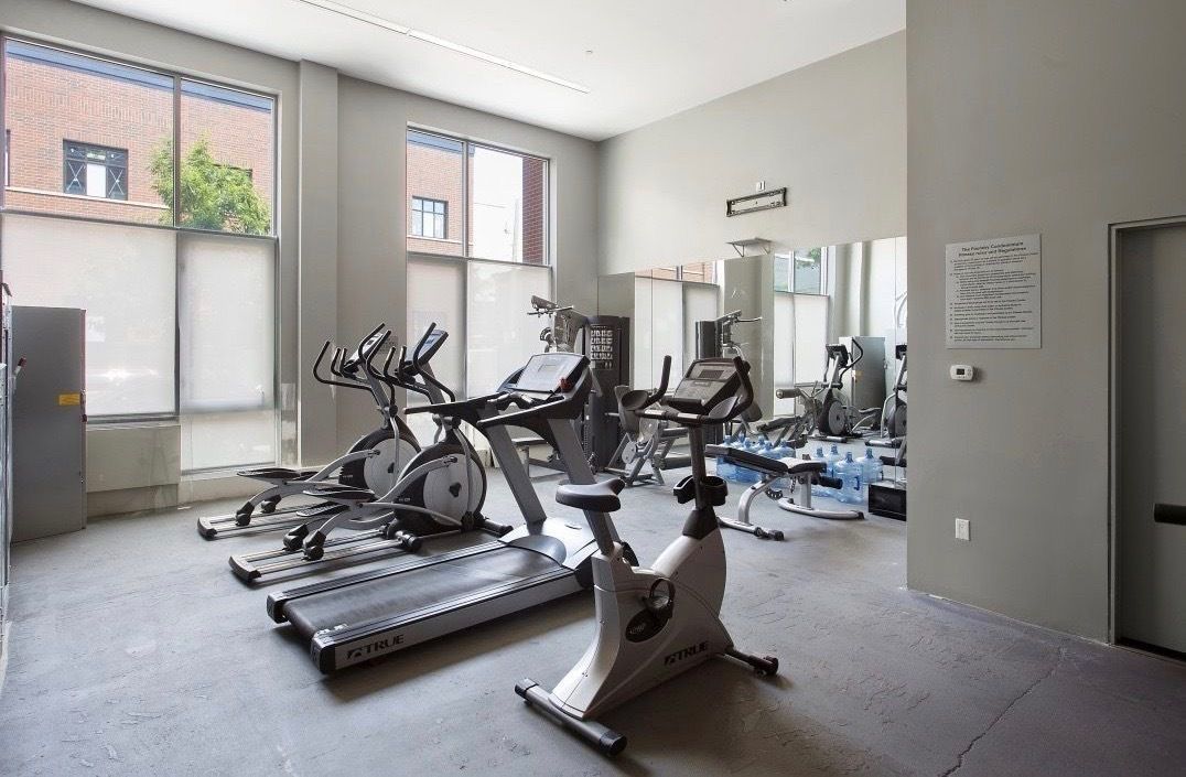2-40 51st Avenue, Unit 2N Queens, NY 11101 - Photo 8 of 12 a view of a room with gym equipment