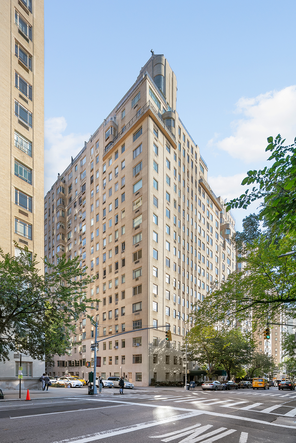 875 5th Avenue, Unit 8D Manhattan, NY 10065 - Photo 12 of 13 a view of a tall building next to a road