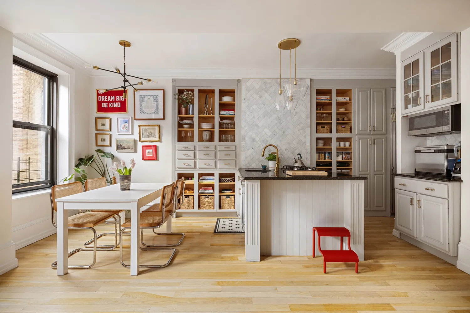 a room with a workspace and a window