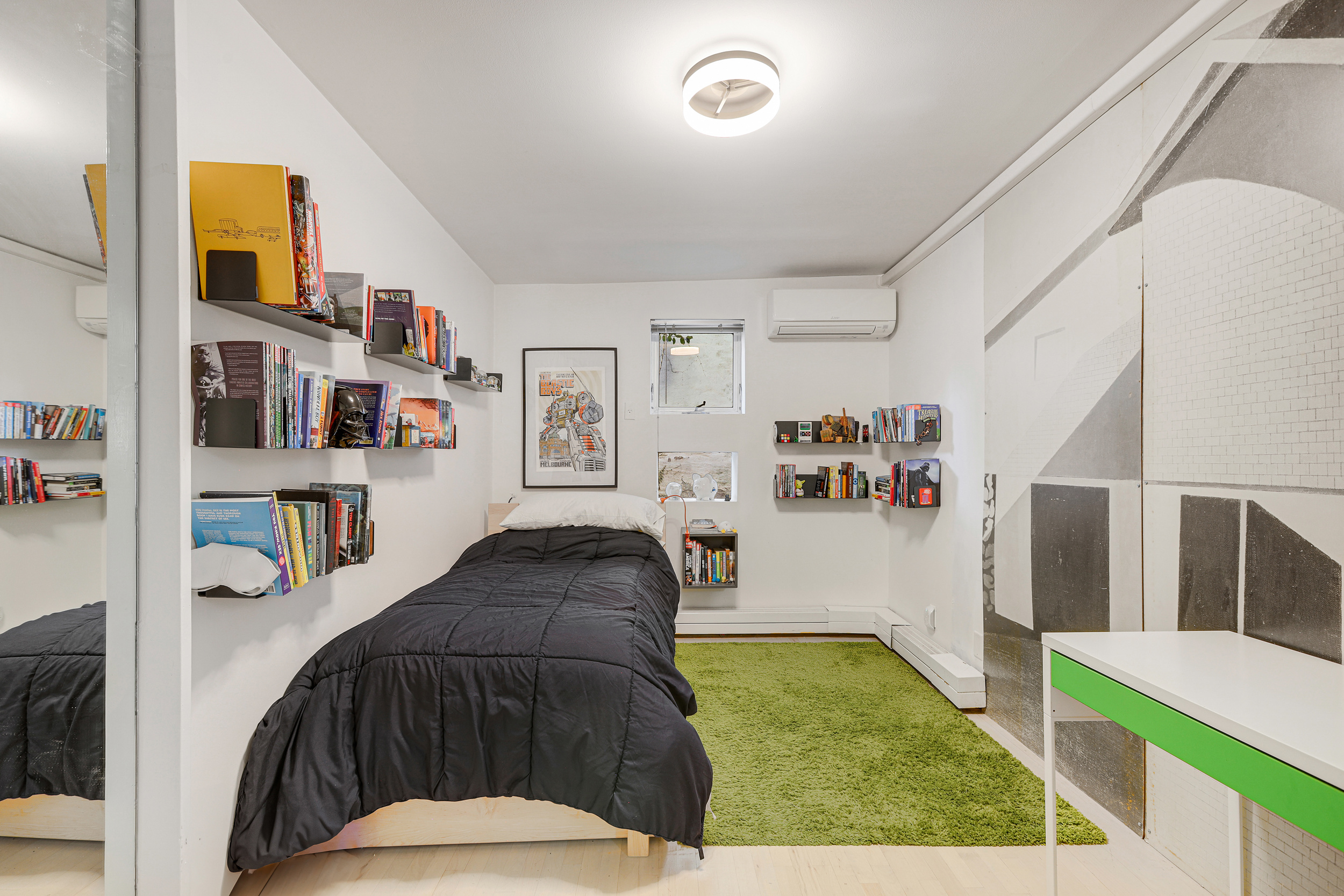 56 Bergen Street, Unit 1R Brooklyn, NY 11201 - Photo 6 of 13 a bedroom with a bed and a couch