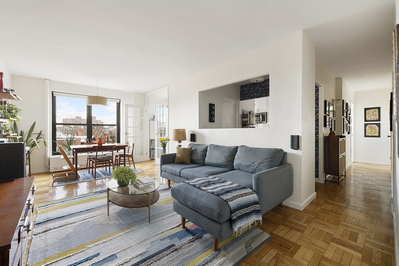 a living room with furniture and a table