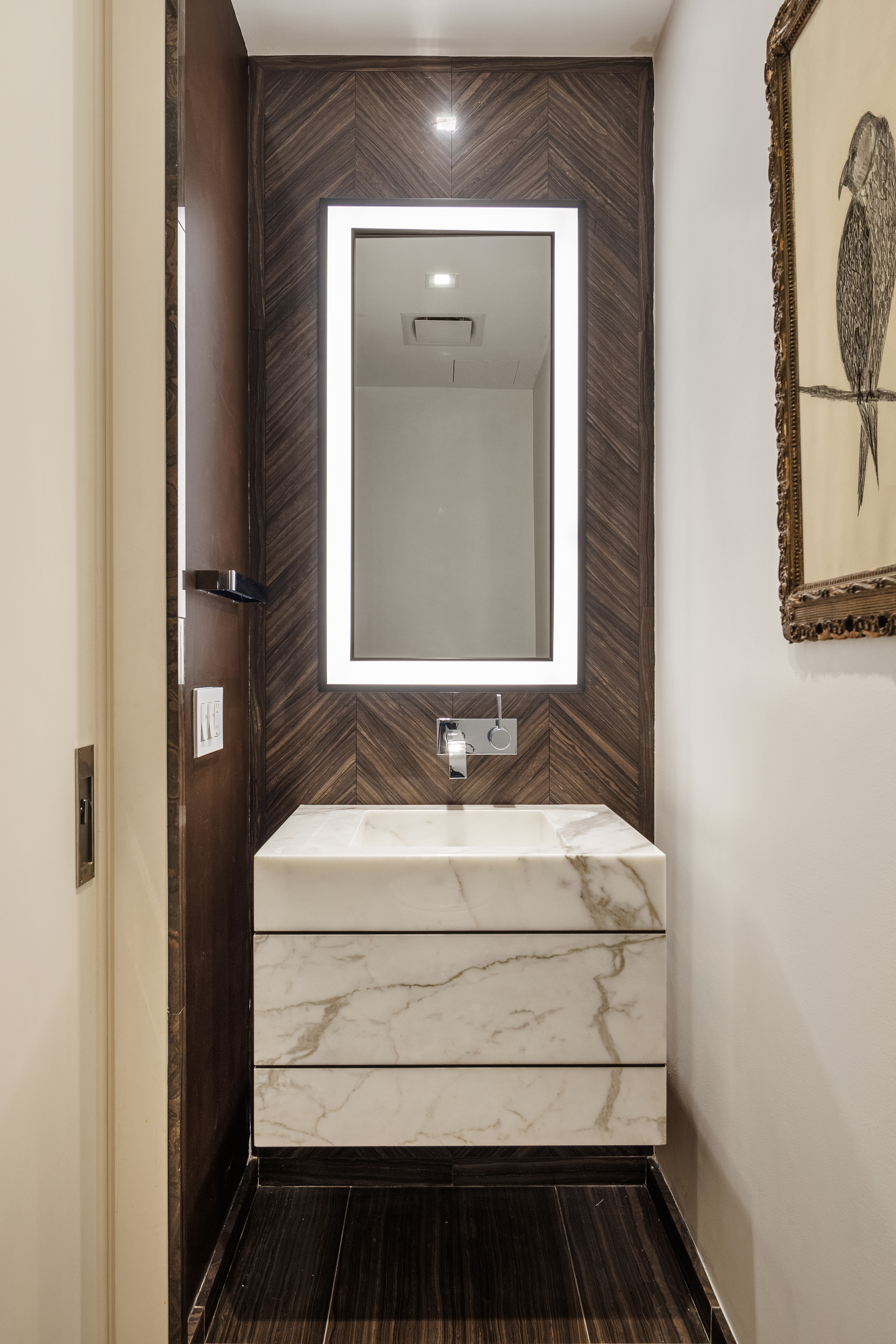 1 West End Avenue, Unit 22E Manhattan, NY 10023 - Photo 12 of 32 a bathroom with a sink and a mirror