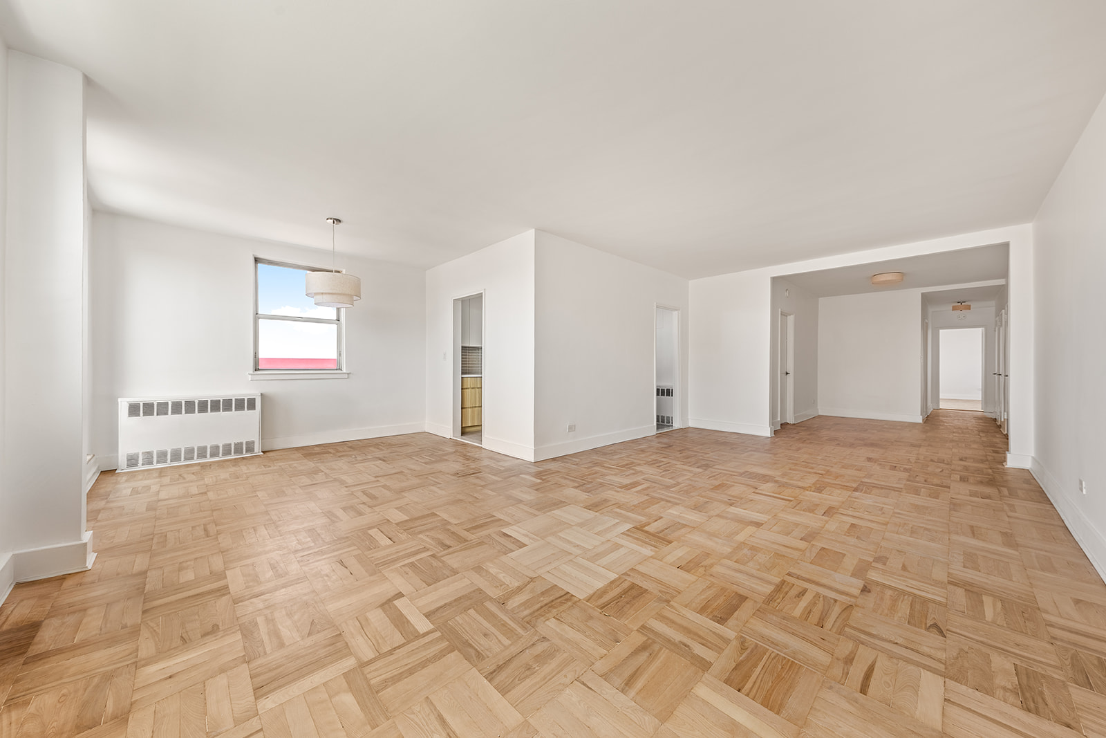 110-50 71st Road, Unit PHD Queens, NY 11375 - Photo 11 of 14 a view of an empty room and window