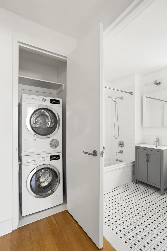a bathroom with a sink a toilet and a bathtub