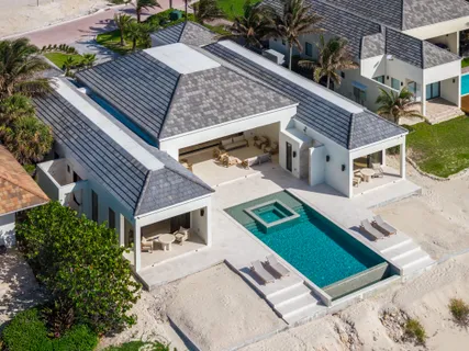 a aerial view of a house with a yard