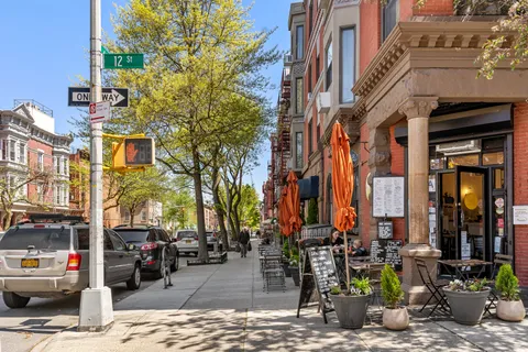 a city street lined with tall buildings