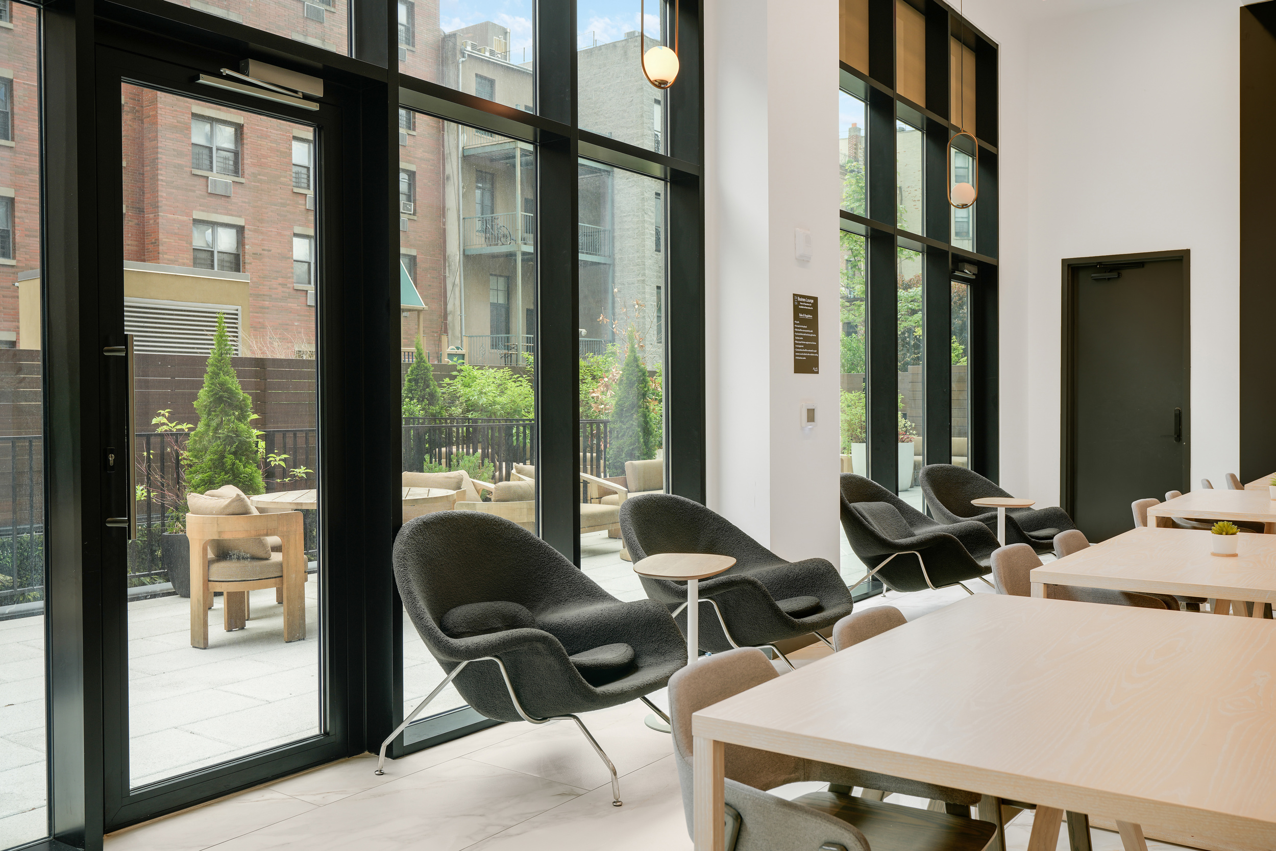 224 West 124th Street, Unit 1605 Manhattan, NY 10027 - Photo 20 of 23 a view of balcony with two chairs and a table