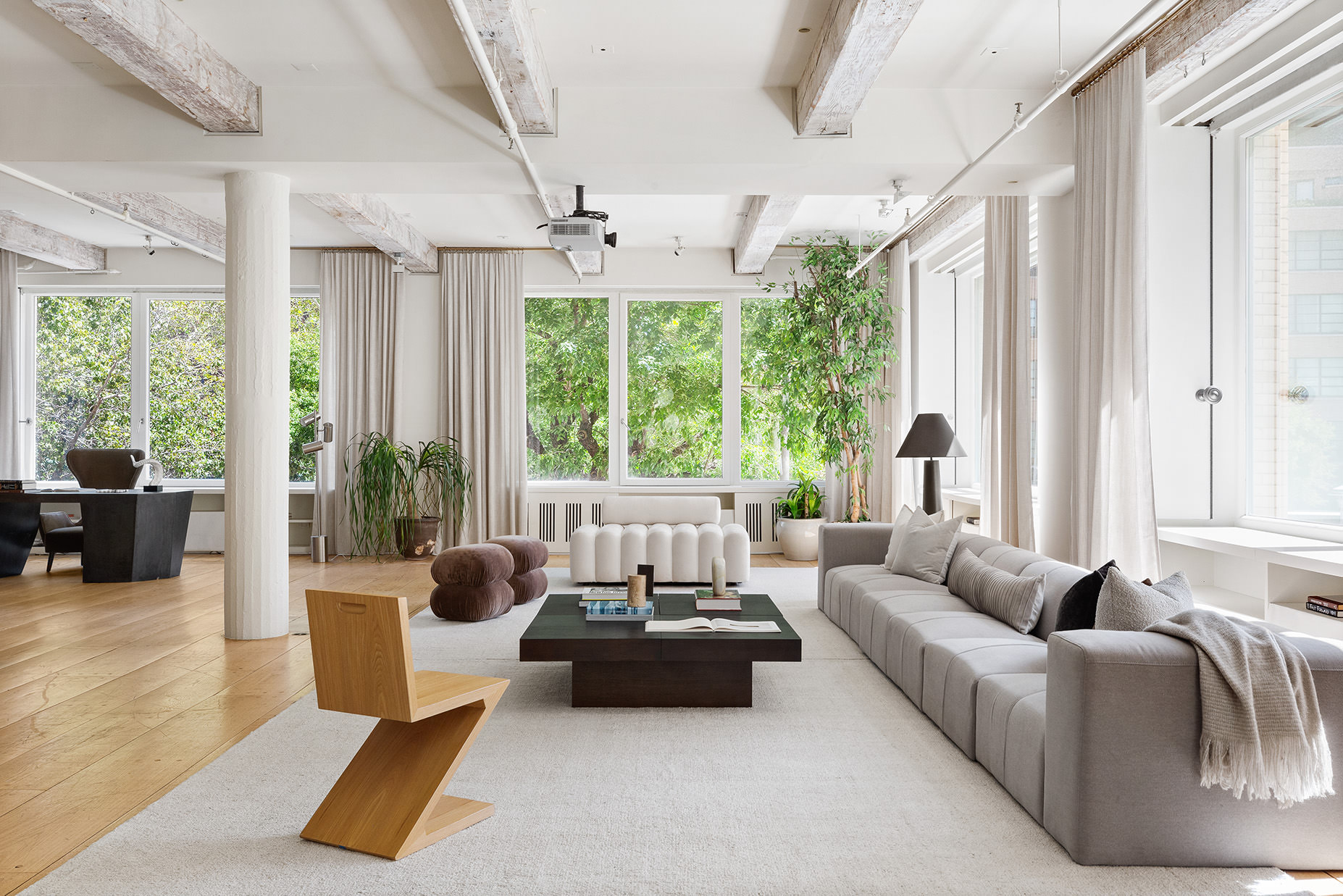 145 6th Avenue, Unit 2B Manhattan, NY 10013 - Photo 10 of 23 a living room with furniture and a large window