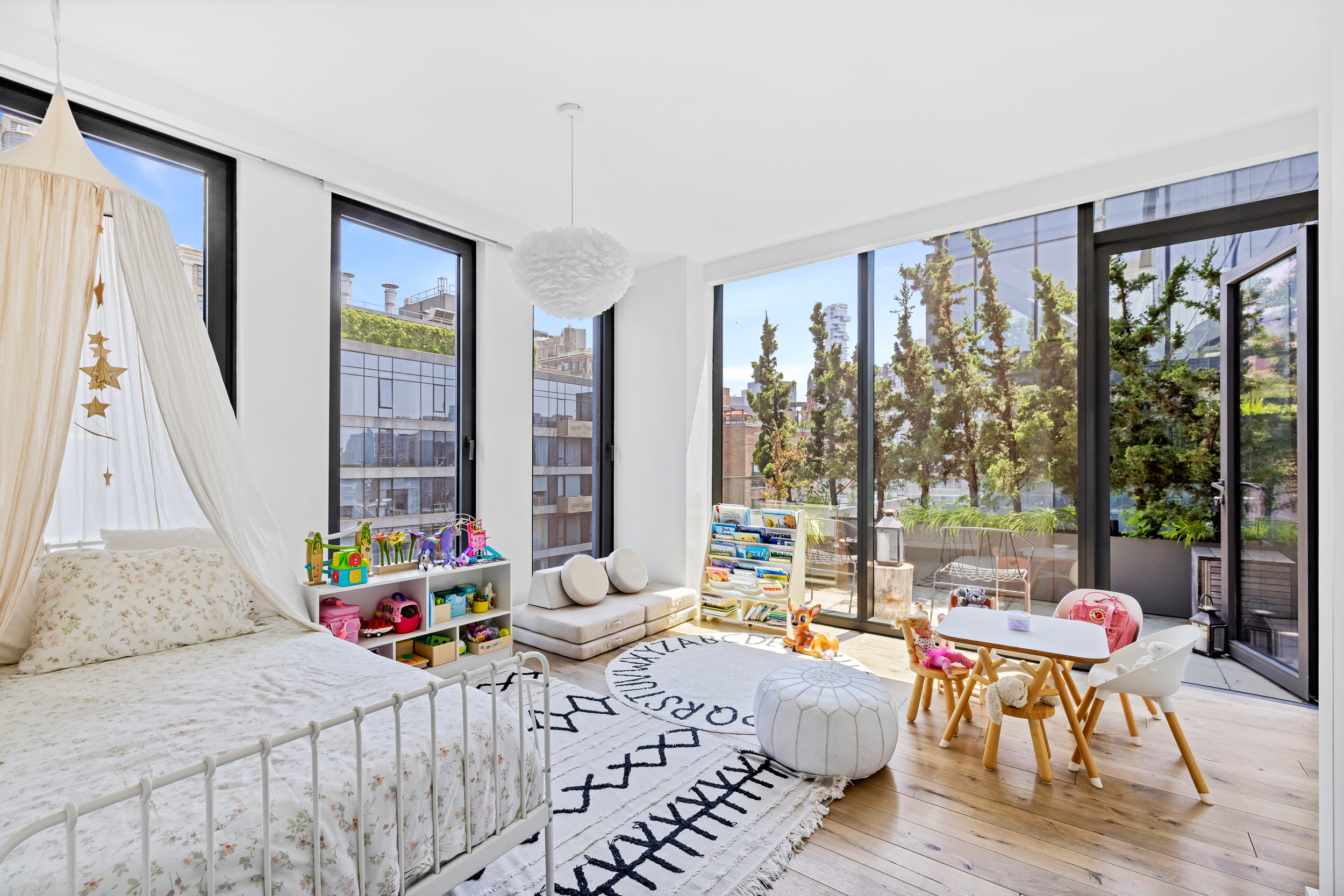 15 Renwick Street, Unit PH2 Manhattan, NY 10013 - Photo 20 of 23 a bedroom with a bed and large windows