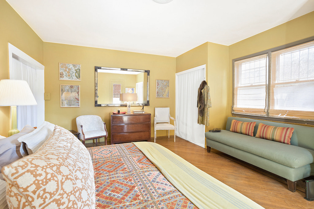 315 Washington Avenue Brooklyn, NY 11205 - Photo 13 of 38 a bedroom with furniture and a large window