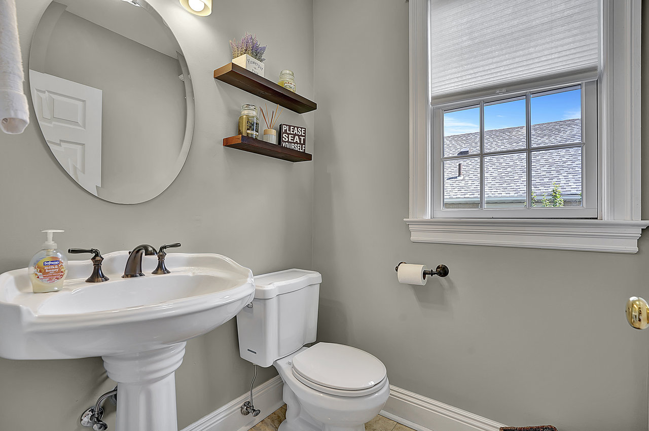 266 Feronia Way Rutherford, NJ 07070 - Photo 24 of 41 a bathroom with a toilet a sink and mirror