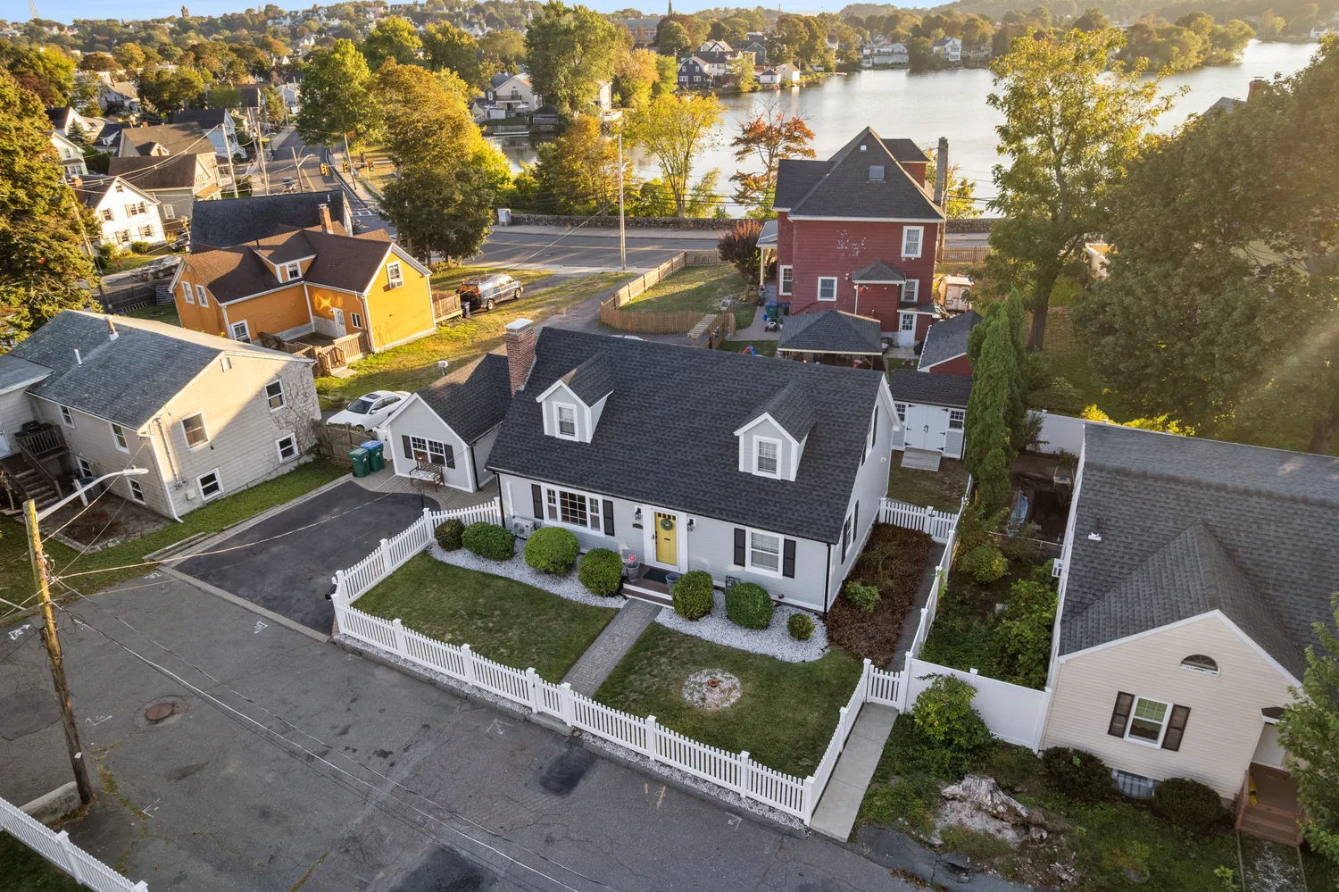 an aerial view of a house with a yard