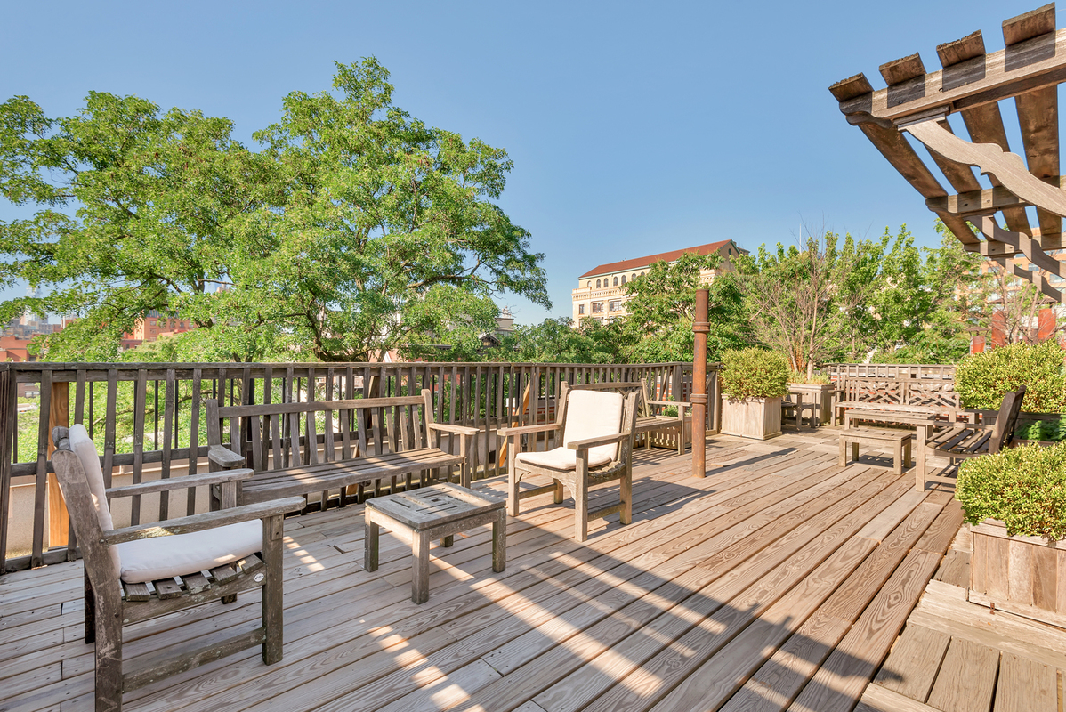 344 West 12th Street, Unit 1A Manhattan, NY 10014 - Photo 13 of 17 a view of a chairs on wooden deck