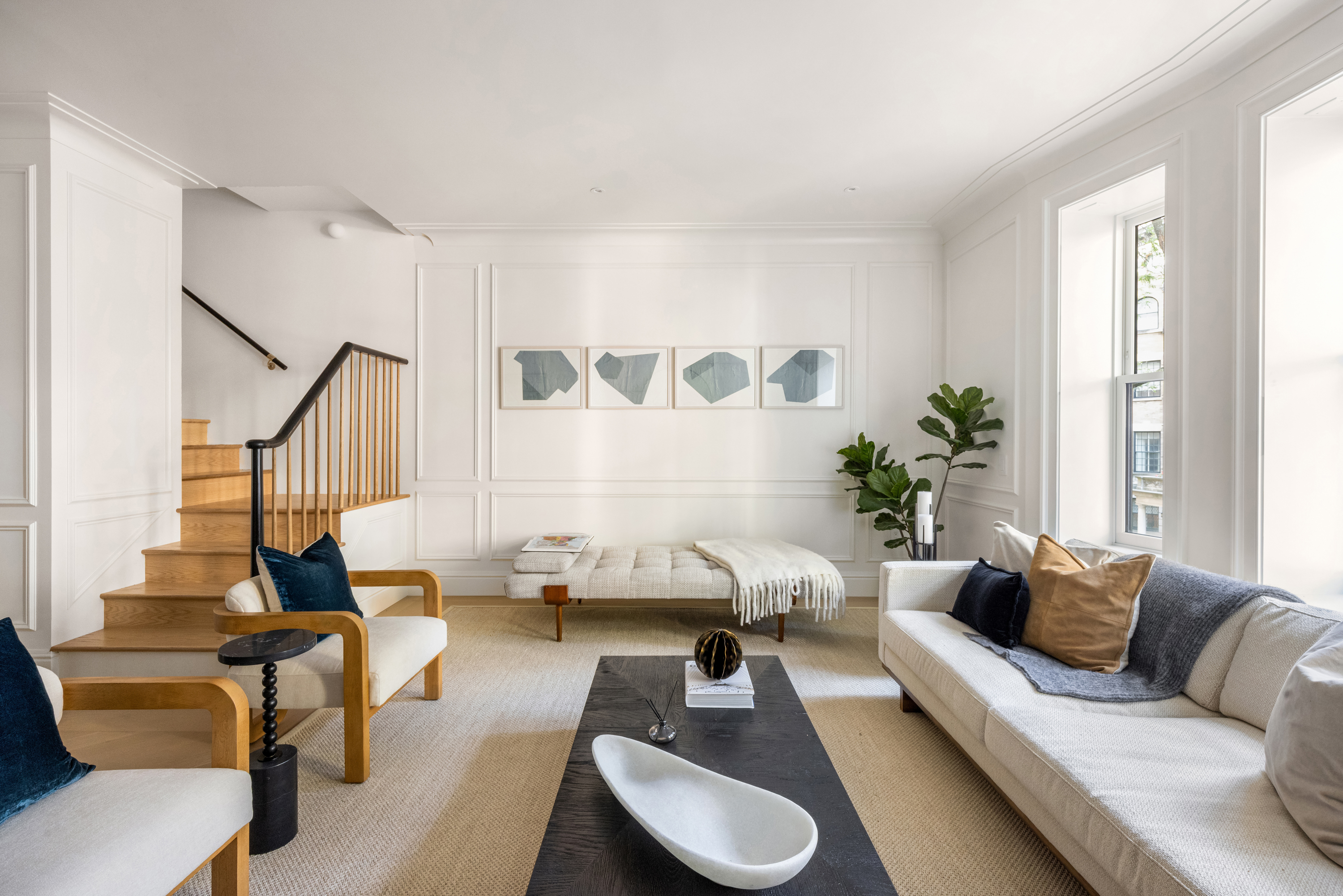 344 West 84th Street, Unit PH Manhattan, NY 10024 - Photo 4 of 19 a living room with furniture or couch and a potted plant