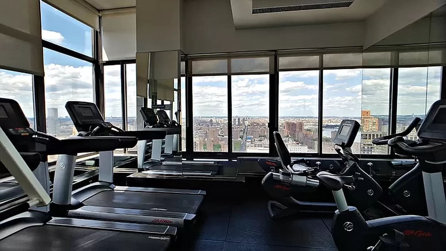300 East 93rd Street, Unit 14F Manhattan, NY 10128 - Photo 11 of 14 a view of a room with gym equipment