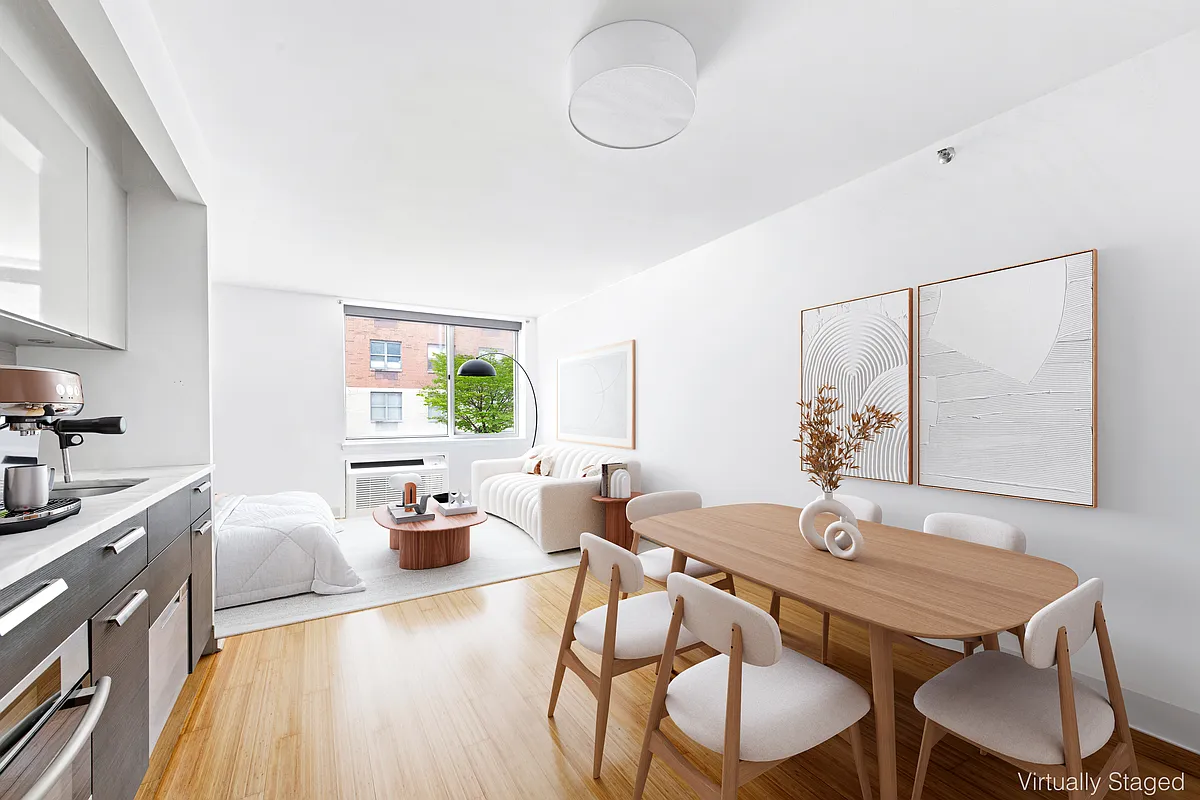 505 West 47th Street, Unit 2BS Manhattan, NY 10036 - Photo 2 of 5 a view of a dining room with furniture