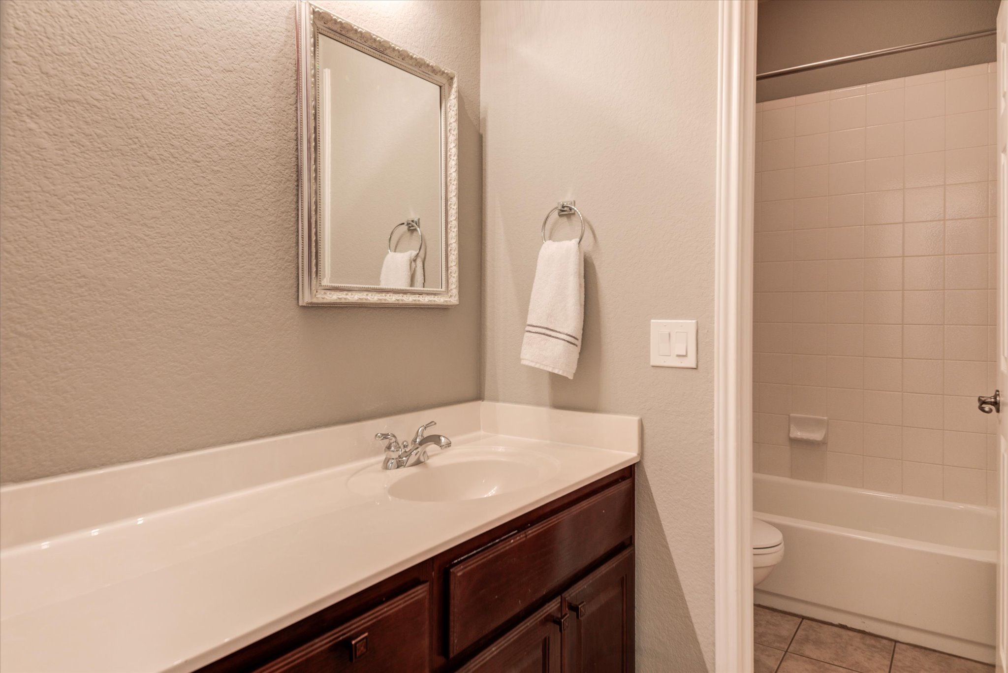 5412 Batak Lane Austin, TX 78749 - Photo 21 of 40 a bathroom with a sink and a mirror