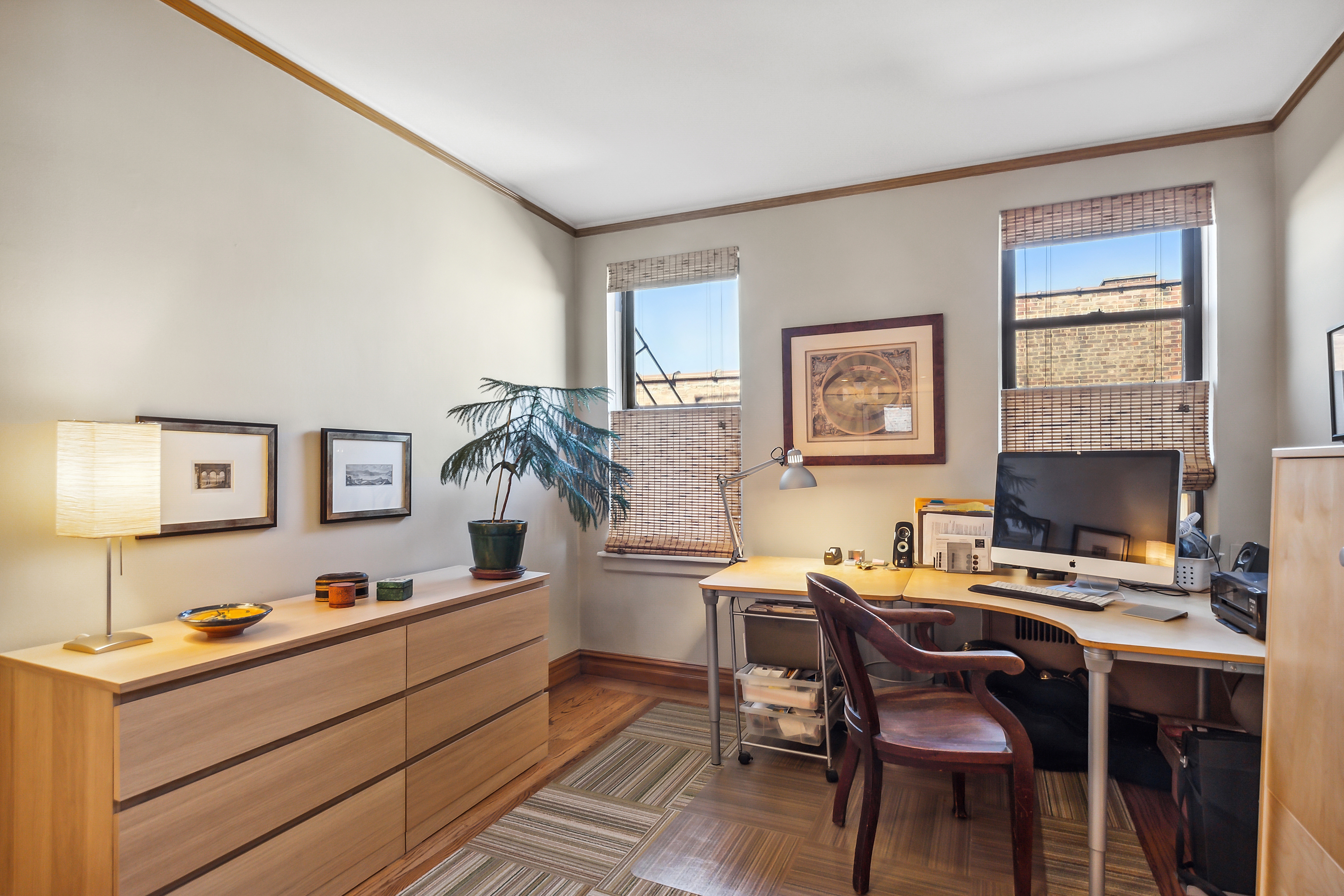 45 Park Terrace West, Unit 5A Manhattan, NY 10034 - Photo 8 of 22 a workspace with furniture and window