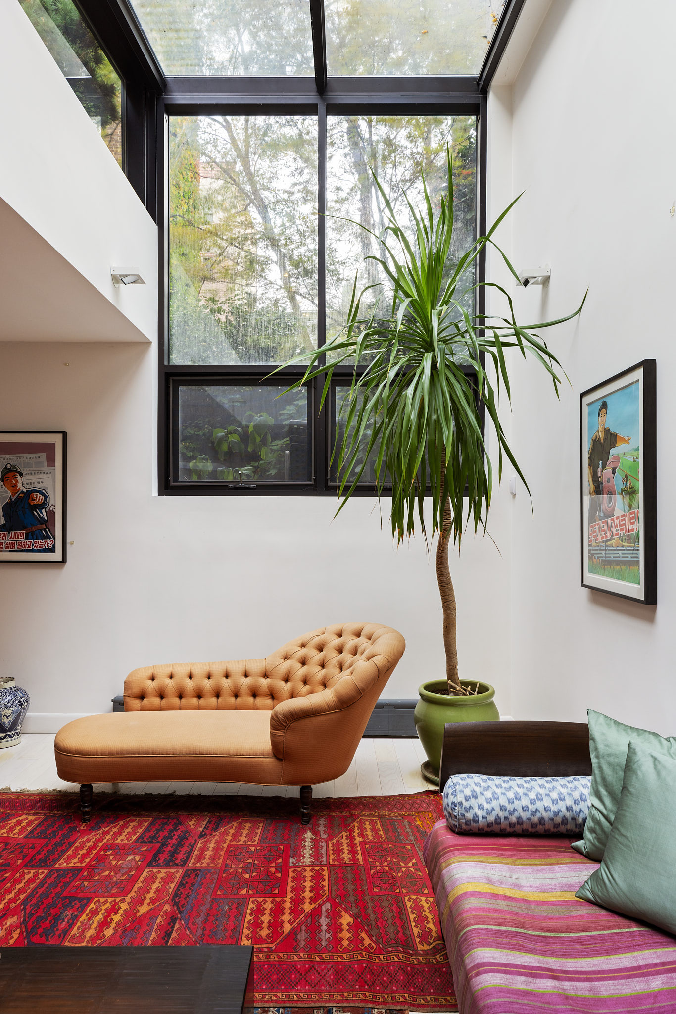 13 Vandam Street Manhattan, NY 10014 - Photo 22 of 26 a living room with furniture and a potted plant