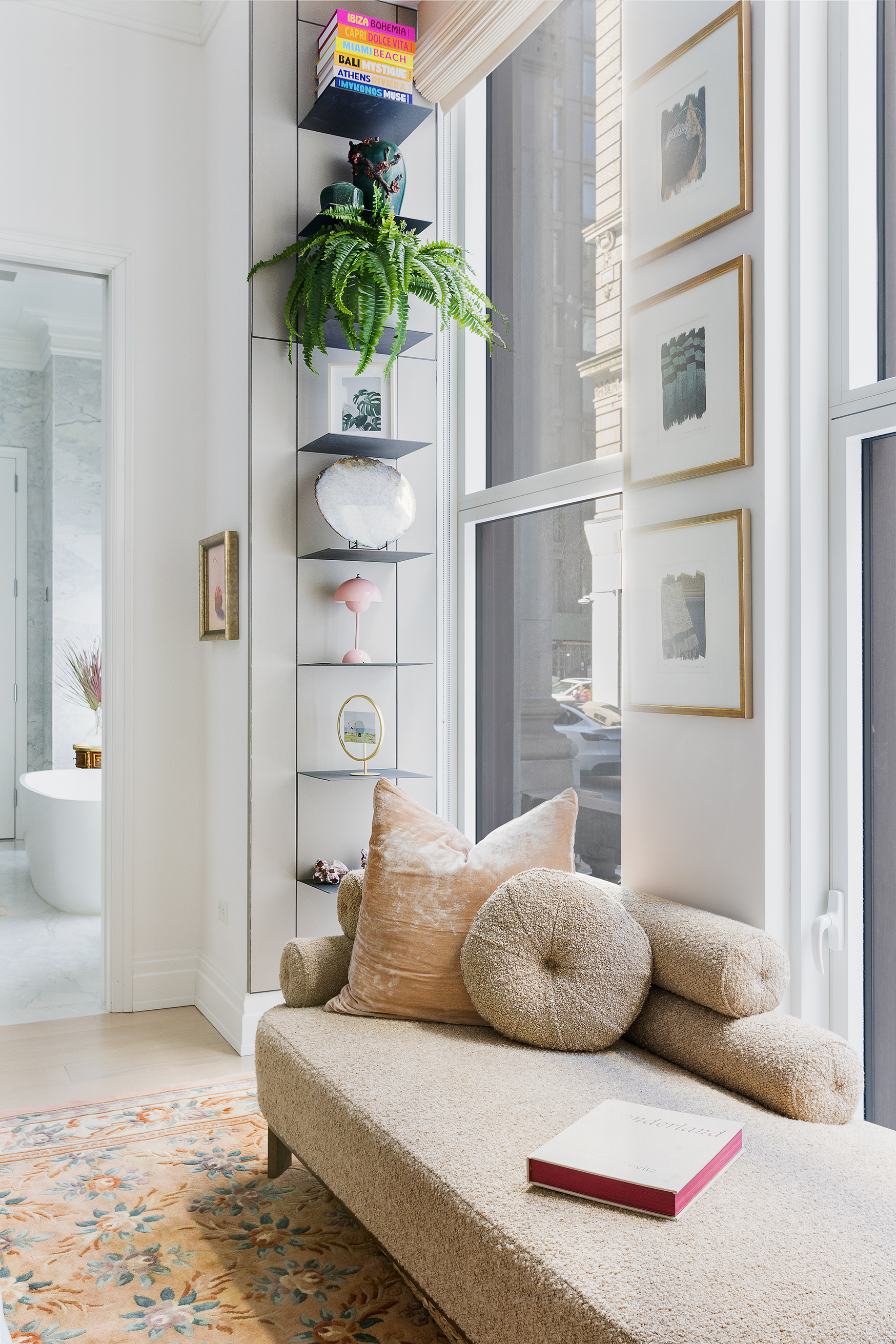 108 Leonard Street, Unit 2A Manhattan, NY 10013 - Photo 2 of 7 a living room with furniture and a potted plant