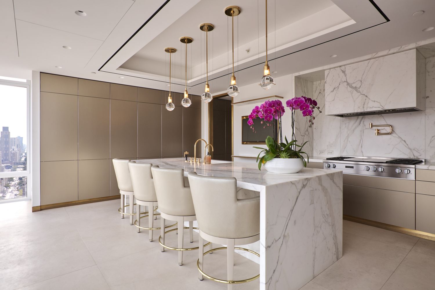 a kitchen with a table and chairs