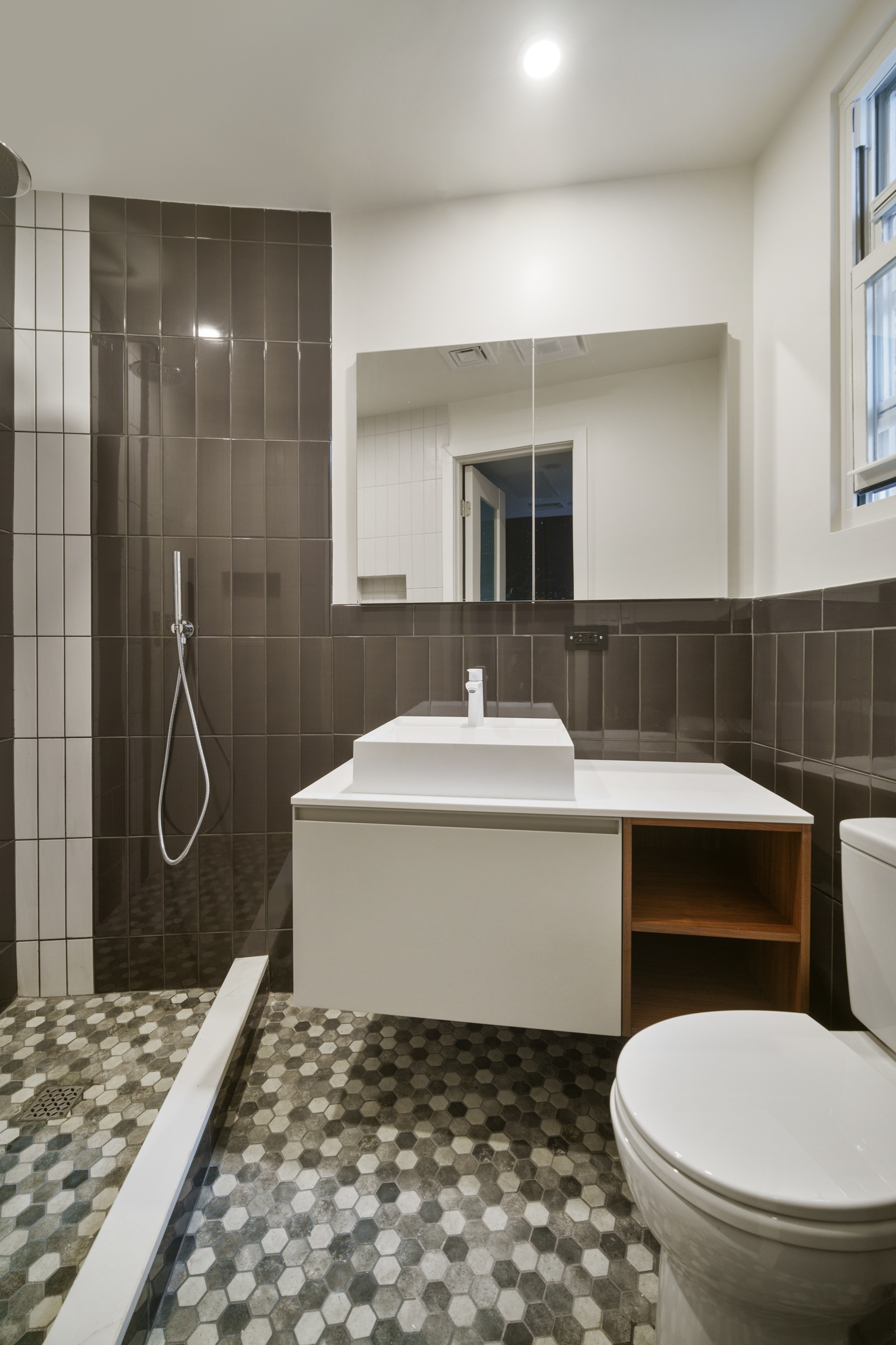 441 Metropolitan Avenue, Unit 1 Brooklyn, NY 11211 - Photo 5 of 11 a bathroom with a sink toilet and shower