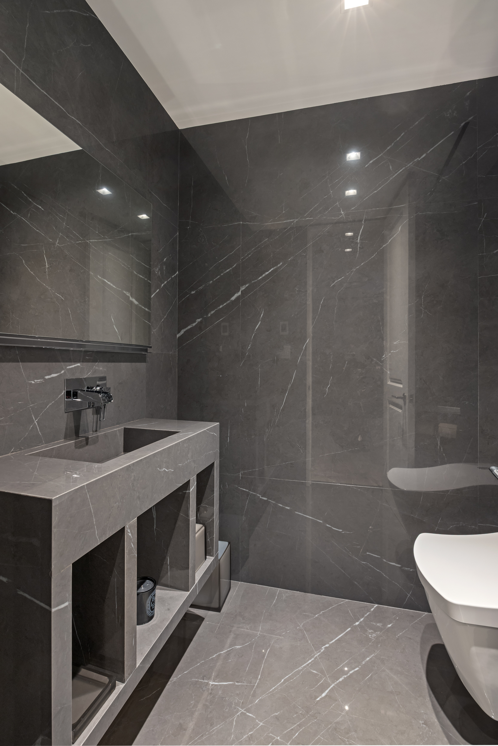 146 Waverly Place Manhattan, NY 10014 - Photo 19 of 41 a bathroom with a sink a toilet and a mirror