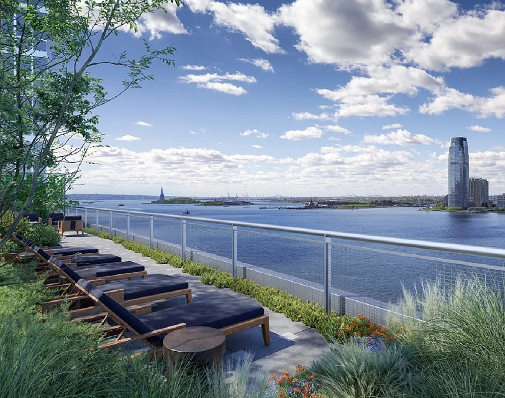 20 River Terrace, Unit 14C Manhattan, NY 10282 - Photo 17 of 18 a view of a backyard with sitting area