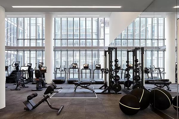 565 Broome Street, Unit S7B Manhattan, NY 10013 - Photo 8 of 13 a view of a room with gym equipment