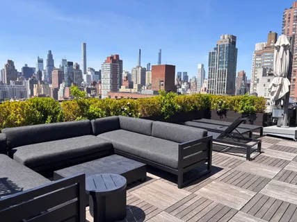 a view of a terrace with furniture