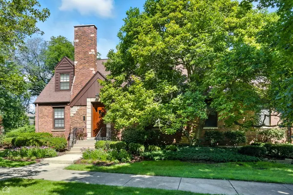 front view of a house with a yard