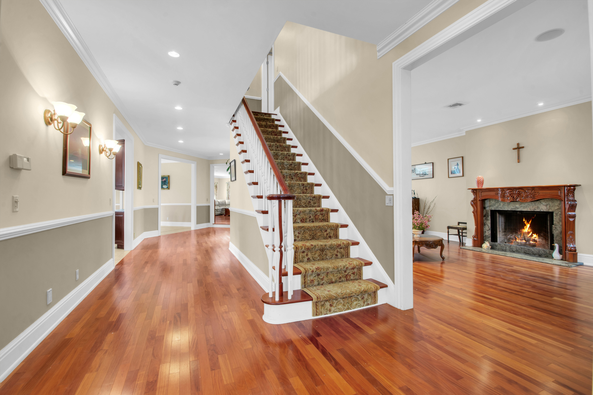 68 Circle Road Staten Island, NY 10304 - Photo 15 of 38 a living room with wooden floors and a fireplace