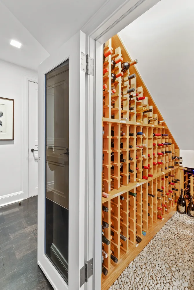 walk in closet with wooden floor