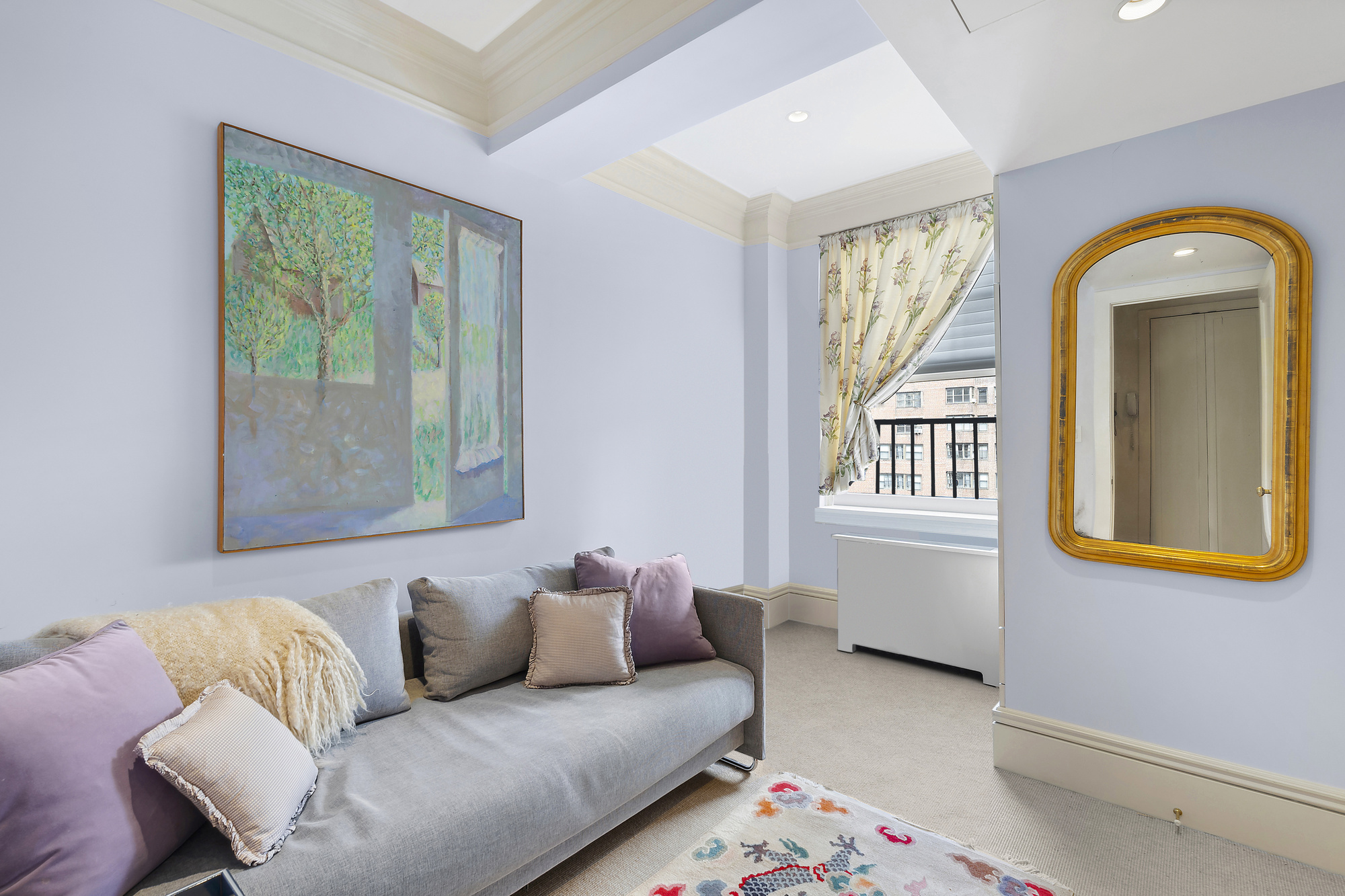 31 East 79th Street, Unit 10E Manhattan, NY 10075 - Photo 9 of 11 a living room with furniture and a window