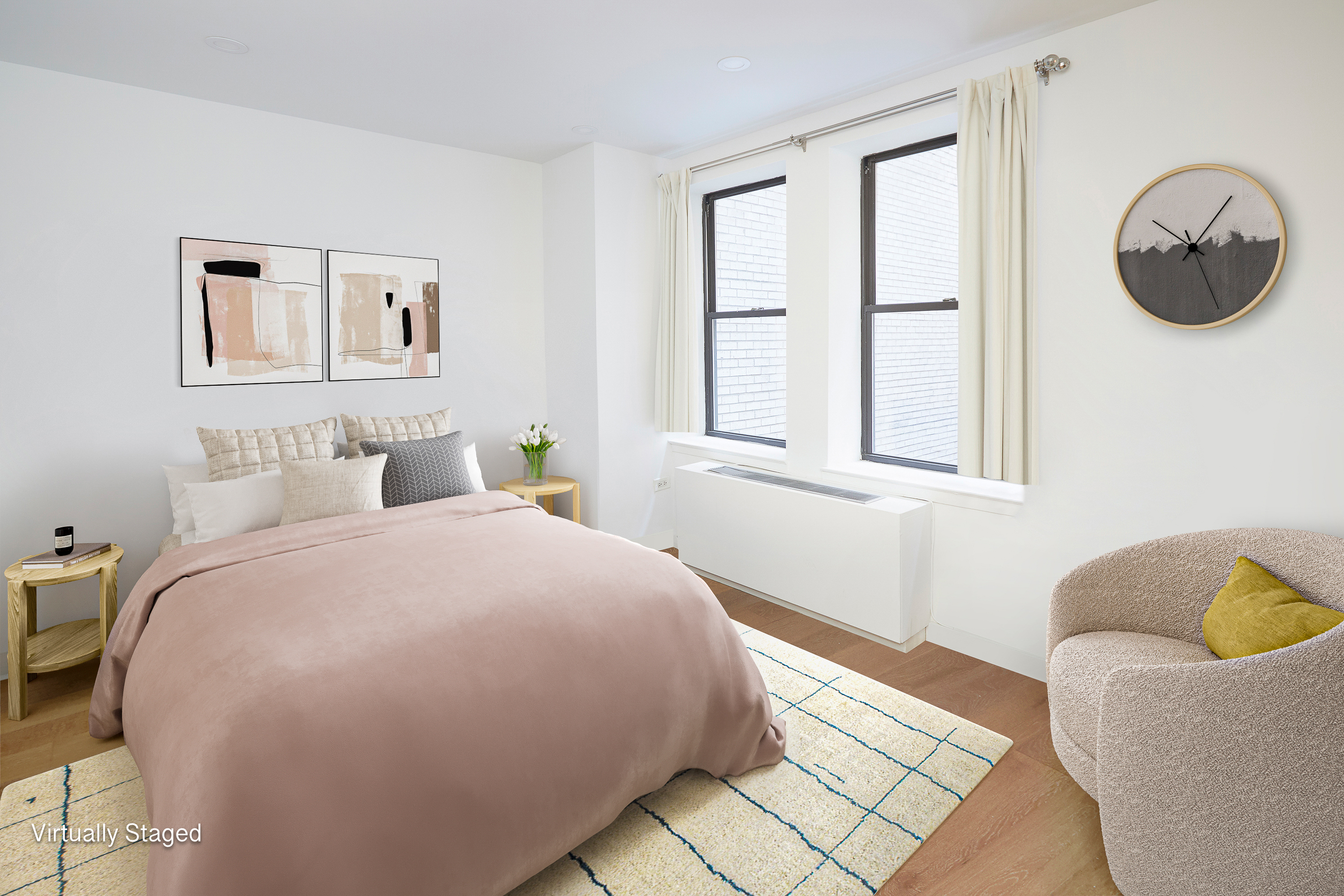 150 West 51st Street, Unit 1528 Manhattan, NY 10019 - Photo 2 of 21 a bedroom with a bed and painting on the wall