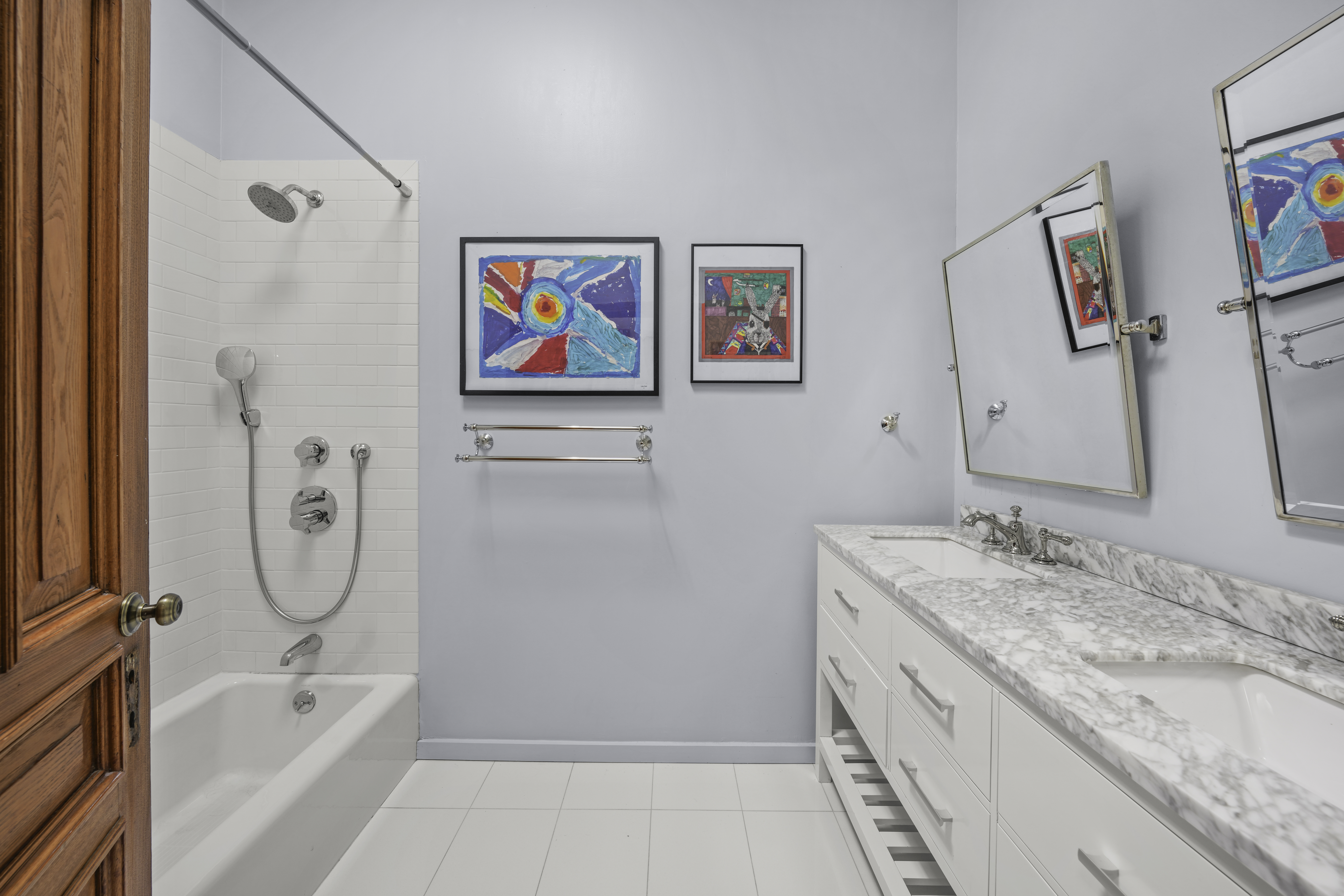 127 West 122nd Street Manhattan, NY 10027 - Photo 13 of 17 a bathroom with a granite countertop tub sink and mirror