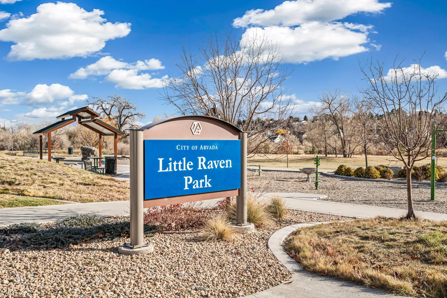 a view of a street with a building in the background