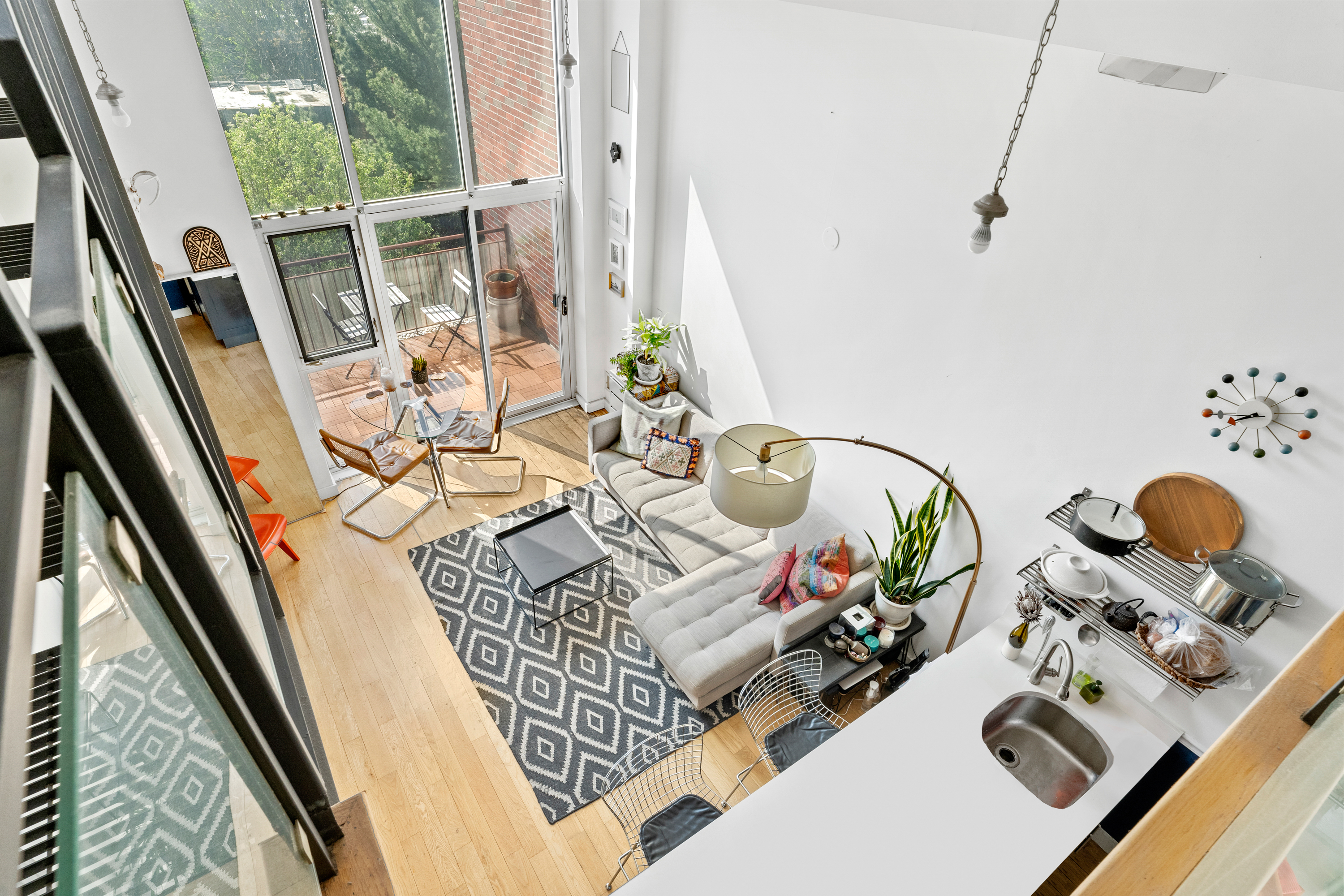 151 Manhattan Avenue, Unit 4B Brooklyn, NY 11206 - Photo 6 of 11 a view of living room with furniture and rug