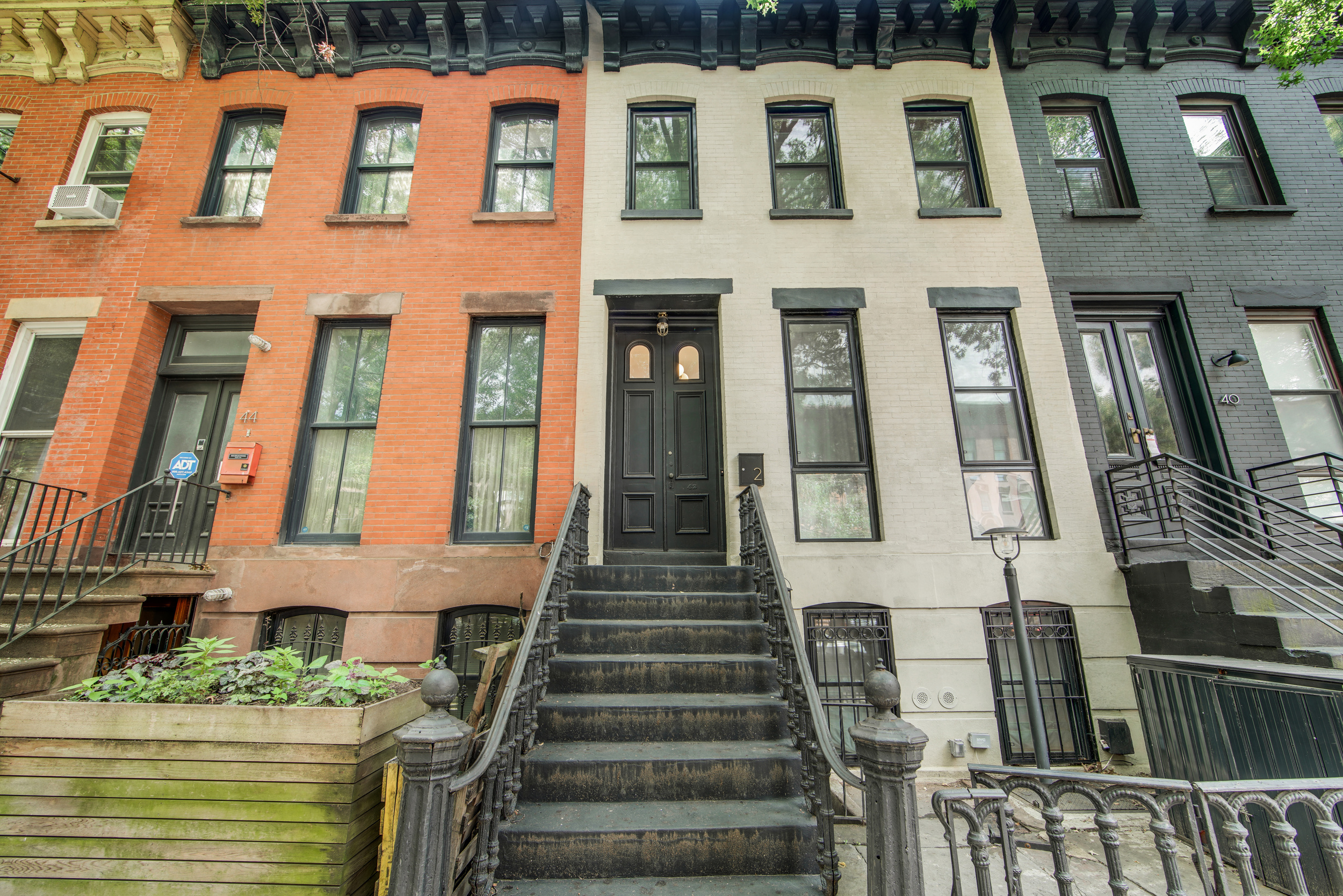 42 Monroe Street Brooklyn, NY 11238 - Photo 2 of 21 a front view of a multi story residential apartment building