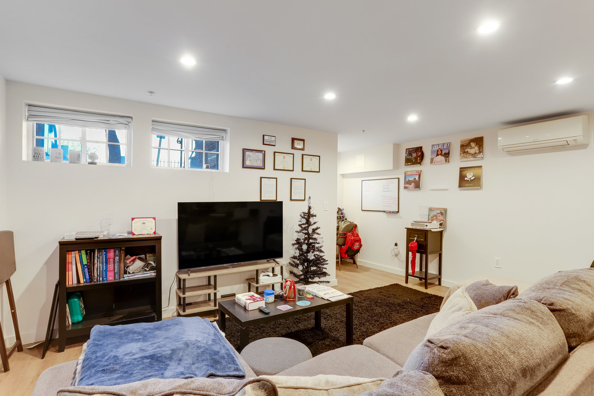 1920 35th Street Northwest Washington, DC 20007 - Photo 40 of 54 a living room with furniture and a flat screen tv