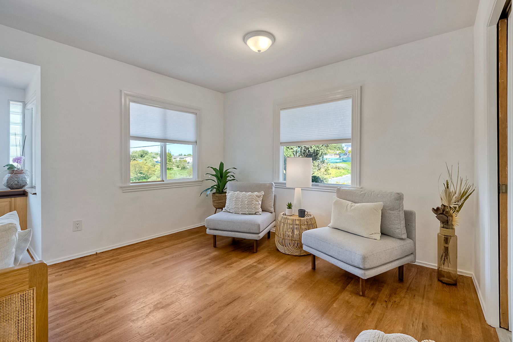 534 Hoover Street Oceanside, CA 92054 - Photo 10 of 31 a living room with furniture and a wooden floor