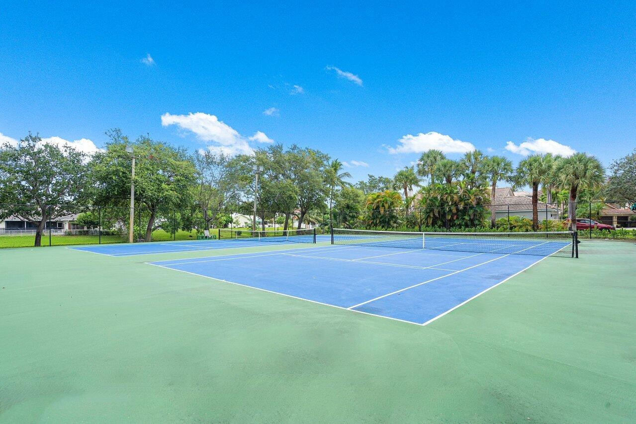 1182 Canoe Point Delray Beach, FL 33444 - Photo 44 of 46 a view of a tennis court