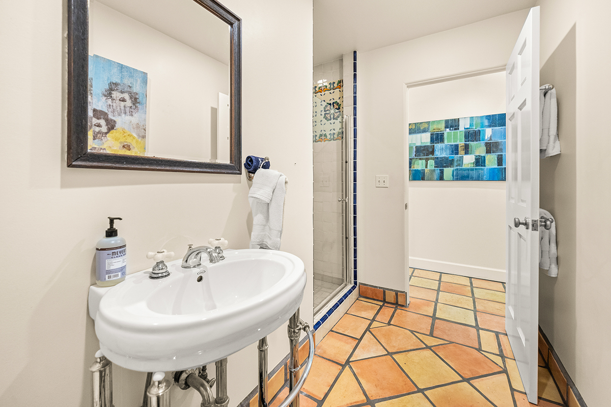 161 Loureyro Road Montecito, CA 93108 - Photo 31 of 52 a bathroom with a sink and mirror