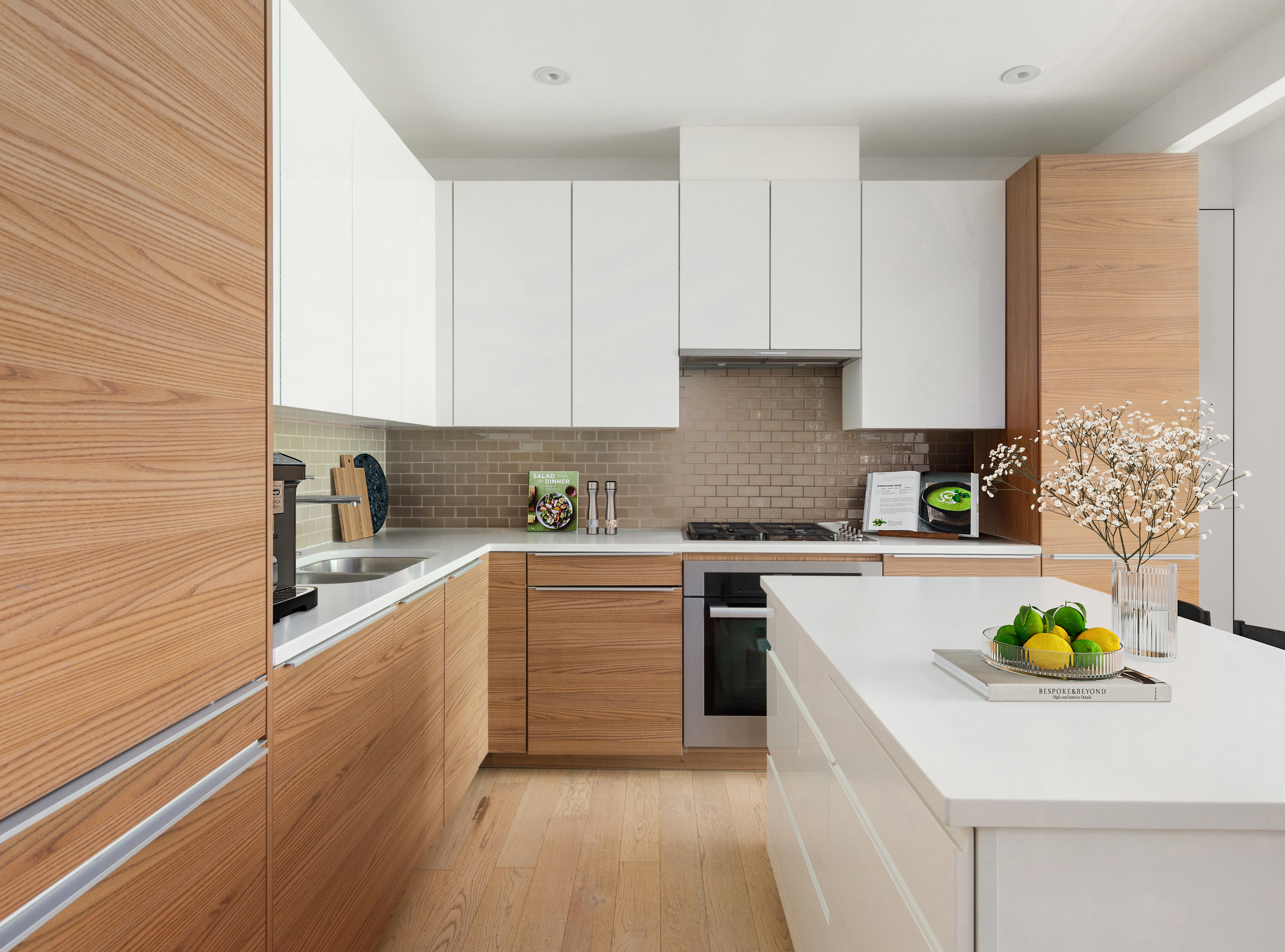 337 East 62nd Street, Unit 3C Manhattan, NY 10065 - Photo 4 of 14 a kitchen with a sink a stove cabinets and wooden floor