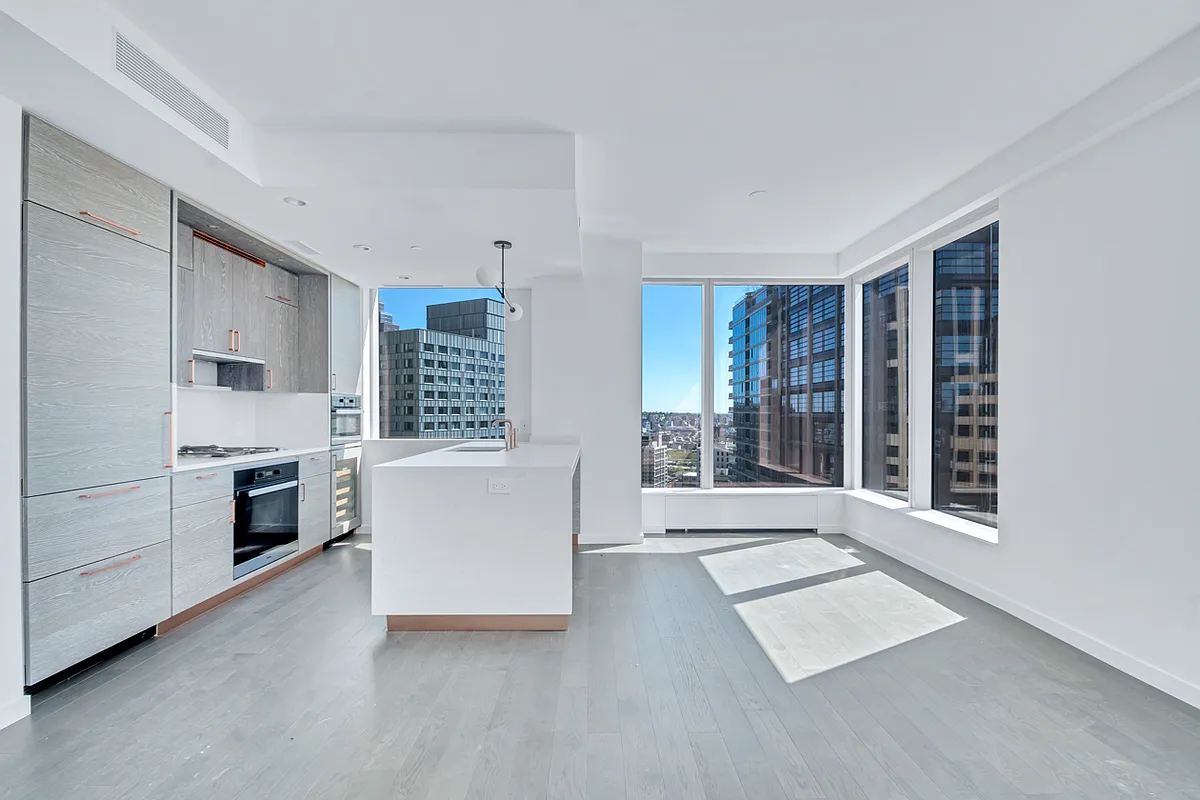 1 City Point, Unit 25L Brooklyn, NY 11201 - Photo 2 of 25 a living room with stainless steel appliances furniture and a kitchen