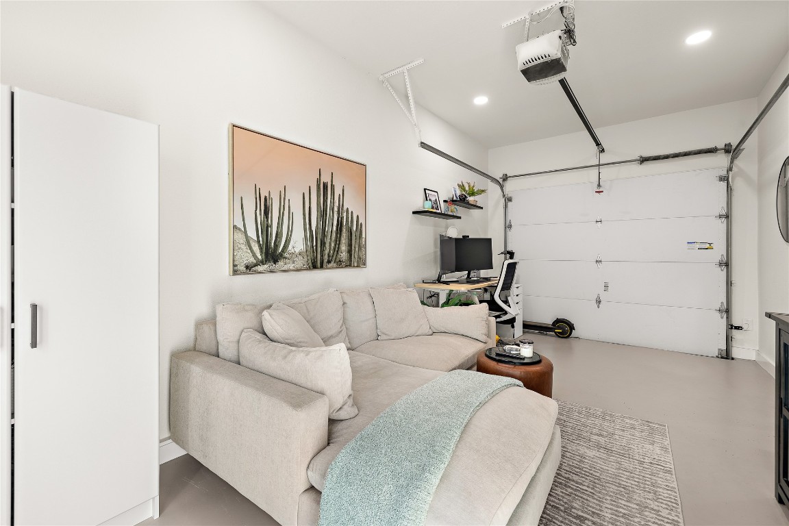 1402 Singleton Avenue, Unit B Austin, TX 78702 - Photo 13 of 26 a living room with furniture and a ceiling fan