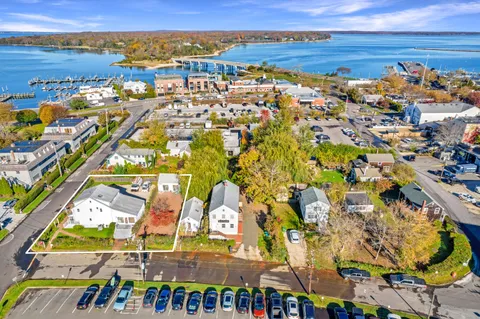 an aerial view of residential building and parking space
