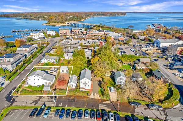 an aerial view of residential building and parking space