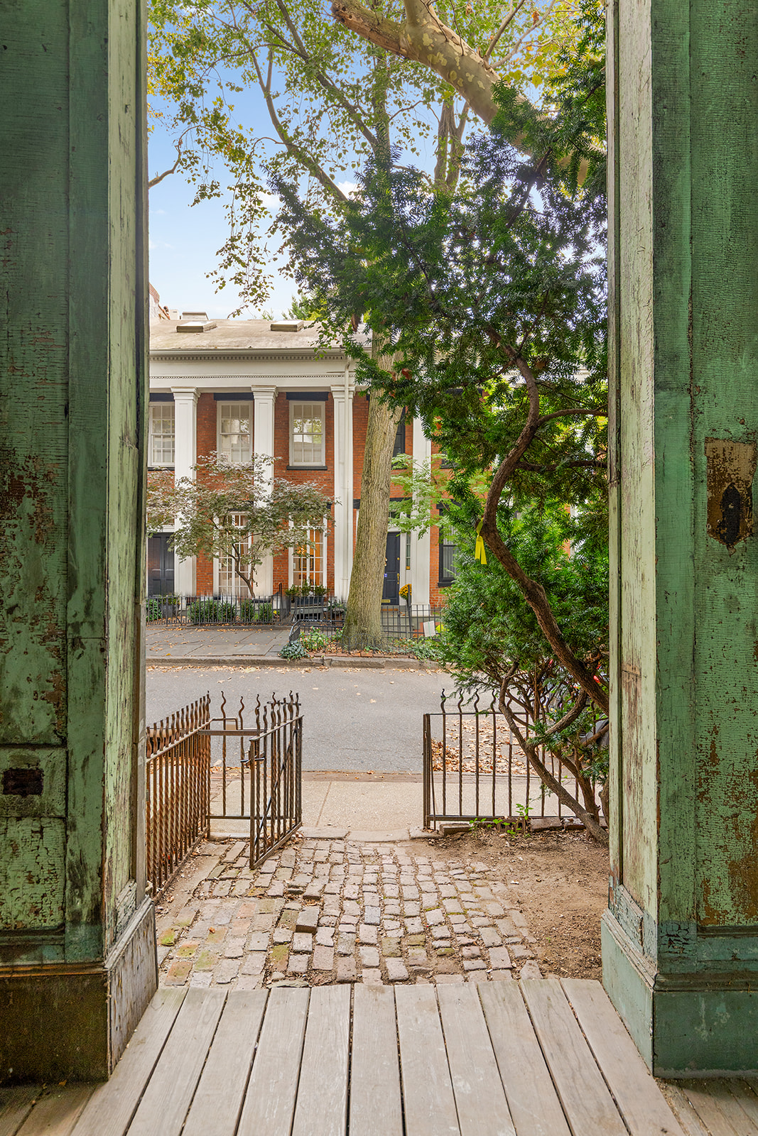 46 Willow Place Brooklyn, NY 11201 - Photo 25 of 31 a front view of a house with a porch